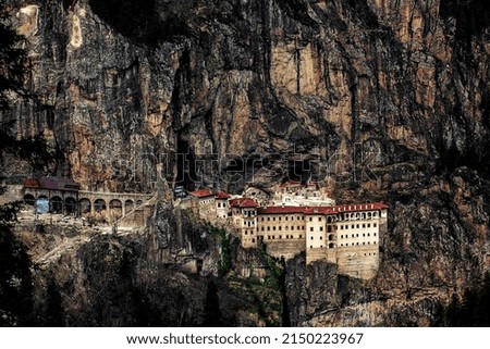 Turkey. Region Macka of Trabzon city - Altindere valley. The Sumela Monastery - 1600 year old ancient Orthodox monastery of the Panaghia located at a 1200 meters height on the steep cliff. Royalty-Free Stock Photo #2150223967