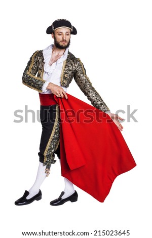Male dressed as matador on a white background. Studio portrait  Royalty-Free Stock Photo #215023645