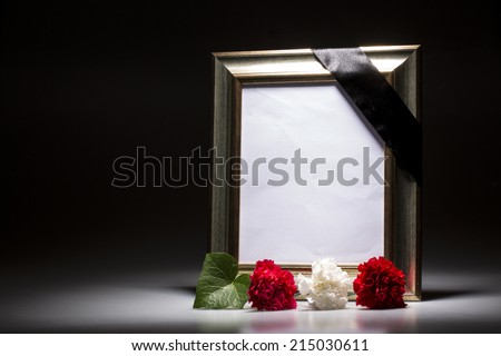 Blank gold mourning frame on the black background