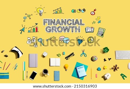 Financial growth with collection of electronic gadgets and office supplies