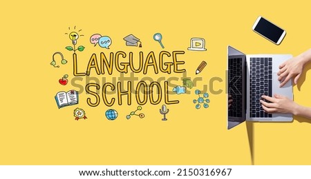 Language school with person working with a laptop