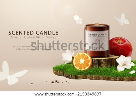 3d aromatic candle promo ad template. Candle mockup displayed on tree stump podium with orange, freesia flower and apple on grass island. Royalty-Free Stock Photo #2150349897