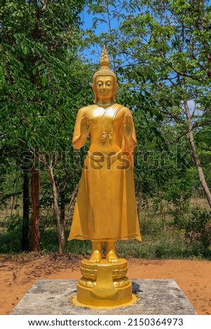 Buddha images for Mondays are "Pang Ban relatives or Ban the sea"
in the standing posture Raise both hands up to the chest (chest) with the palm of the hand stretched forward in a forbidden manner.

