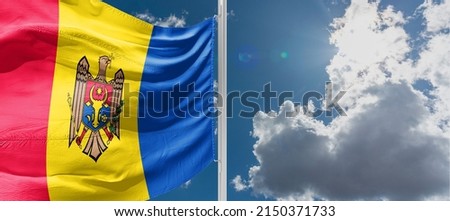 Flag of Moldova The national flag of the Republic of Moldova (Romanian: Drapelul Moldovei) is a vertical triband of blue, yellow, and red,  Royalty-Free Stock Photo #2150371733