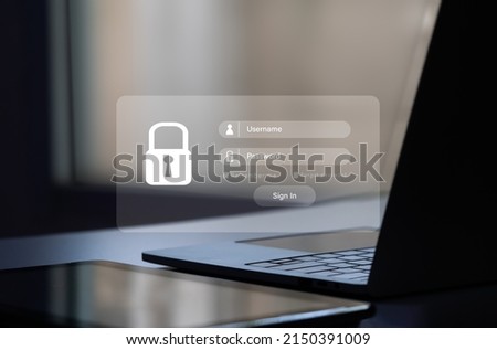The idea is to hack a Phishing mobile phone, digital tablet, and laptop computer with a password to get access to a smartphone, online security issues, and fraud. Royalty-Free Stock Photo #2150391009