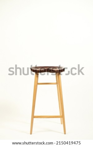 Wooden Bar Stools for kitchen or retaurant,isolated on white background,wood texture.Modern wooden chairs isolated on white