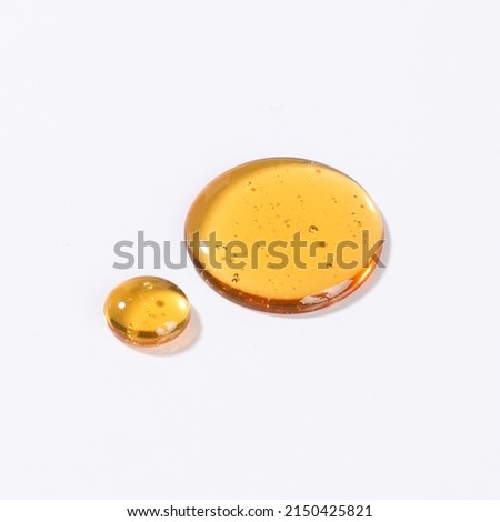 Liquid cosmetic gel or serum texture smudge yellow Royalty-Free Stock Photo #2150425821