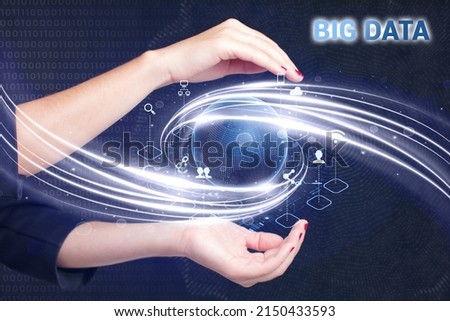 Business, Technology, Internet and network concept. Young businessman working on a virtual screen of the future and sees the inscription: Big data