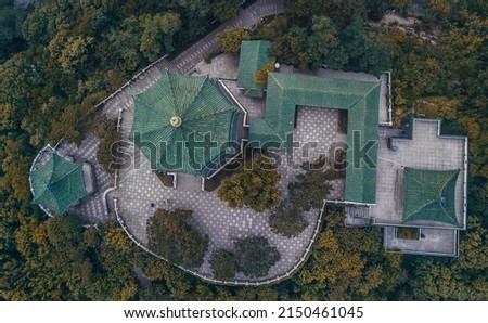 Green gazebo viewed from the air by a drone Royalty-Free Stock Photo #2150461045