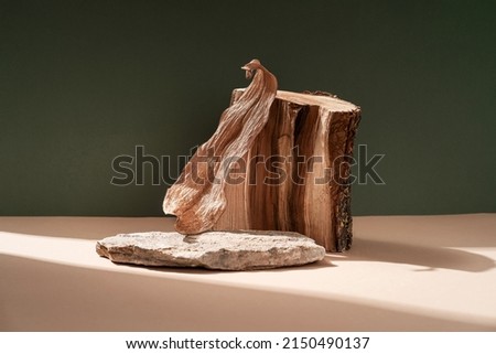 Composition empty podium material tree stone dry flowers. Product presentation. Background beige green. Beautiful background from natural materials Royalty-Free Stock Photo #2150490137
