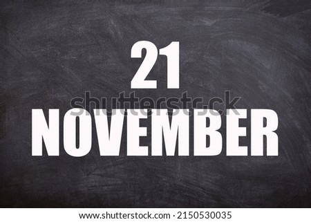 21 November text with blackboard background for calendar. And November is the eleventh and penultimate month of the year