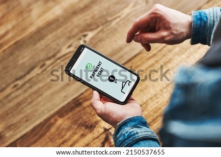 Sending money. Paying online. Online shopping. Buying products. Paying for products in shop using smartphone. Payment confirmation on screen. Online banking. Smartphone screen display
