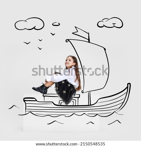 Creative portrait of cute kid, little girl sailing on drawn boat isolated on grey background with pencil sketch. Concept of emotions, ideas, imagination, international children's day. Happy child