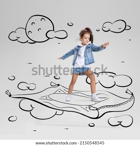 Conceptual artwork. Little girl flying on drawn carpet. Inspiration world for kids. Concept of emotions, ideas, imagination, international children's day. Happy kid dreaming, studying, having fun