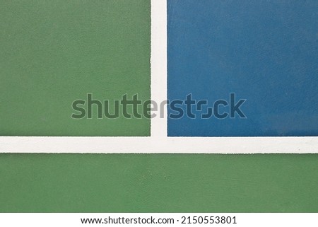 Blue and green tennis, paddle ball, basketball, pickleball court sports and recreation concept Royalty-Free Stock Photo #2150553801