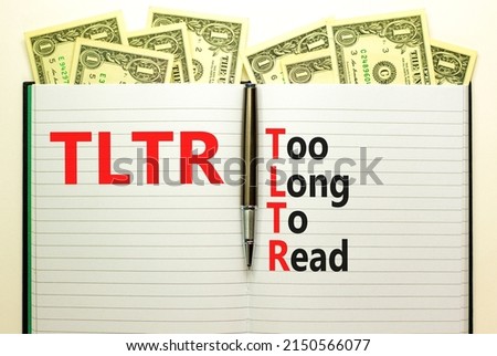 TLTR too long to read symbol. Concept words TLTR too long to read on book on beautiful white background. Dollar bills. Business TLTR too long to read concept. Copy space.