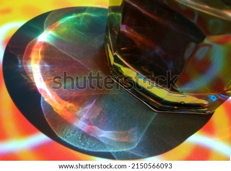 glass of wavy glass on a colorful colorful background