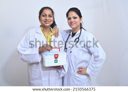 Two female doctors standing together