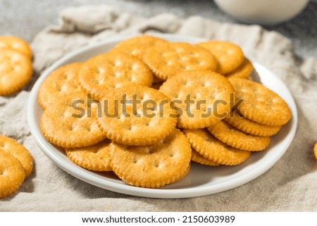 Salty Crispy Round Crackers Ready to Eat Royalty-Free Stock Photo #2150603989