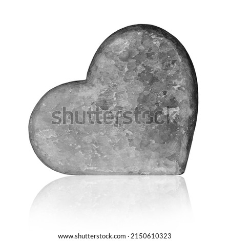 Heart of rock salt. The texture of the salt. Gray-white heart.