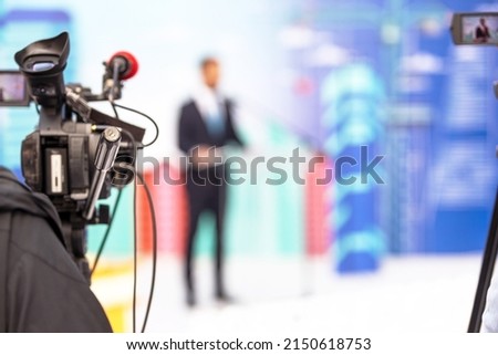 News conference or press briefing at media event. Public relations concept. Royalty-Free Stock Photo #2150618753