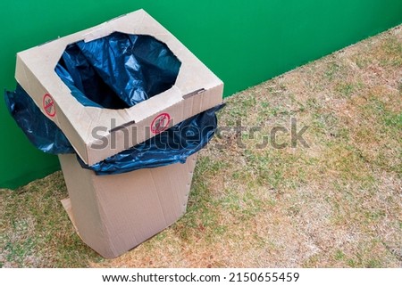 Recycle trash dump made of cardboard.