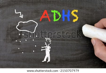 Blackboard ADHS with chalk drawing cloud thunder stress symbol Royalty-Free Stock Photo #2150707979