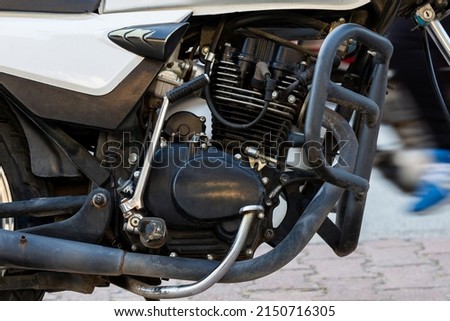 motorcycle engine chrome plated and strong appearing Royalty-Free Stock Photo #2150716305