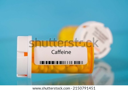 Caffeine. Caffeine pills in RX prescription drug bottle Royalty-Free Stock Photo #2150791451
