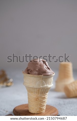 Melting chocolate ice cream cone