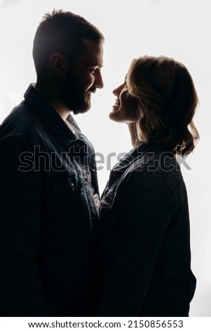 silhouette of a couple, portrait of a couple. close portrait of a couple in love. portrait man woman on white background.