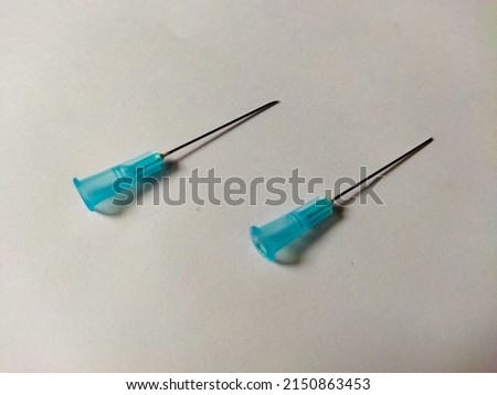 Used syringe on a white background
