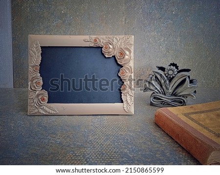 Smooth image frame with old style and decor items with camouflaged background. Can be used as a template for old images. 