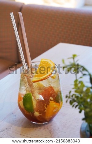 fresh fruit mixed with soda.orange.free space for text. The background. 