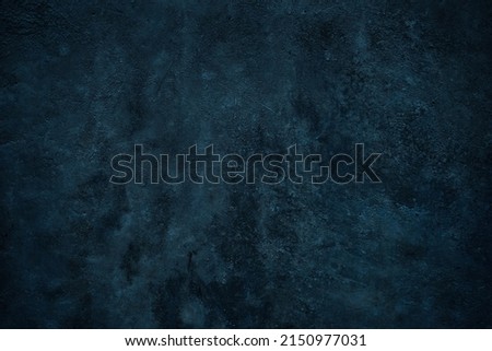    Blue green grunge background. Toned stone wall surface. Close-up. Dark background with space for design.                            