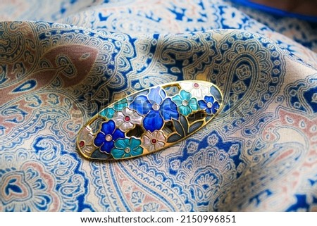 Multicolor Metal Pin Brooch Gold Tone Flowers Cloisonne Enamel Vintage Macro Photography on the Colored Fabric Silk Satin 
