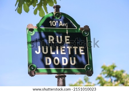 Rue Juliette Dodu street sign, one of the most famous streets in Paris, France.