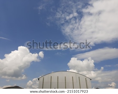white cloud scene with blue sky background