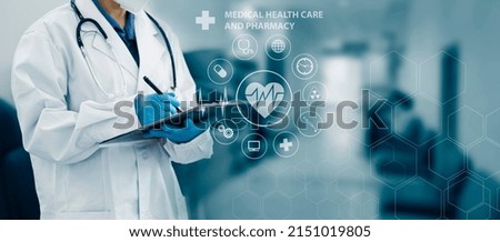 Medicine doctor working with modern medical interface icons on the hospital background, Medical technology and digital network concept.