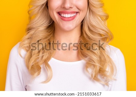 Photo of pretty sweet cute lady dressed white shirt smiling white teeth isolated yellow color background