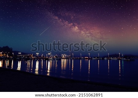 Fishing harbor view with starry sky 