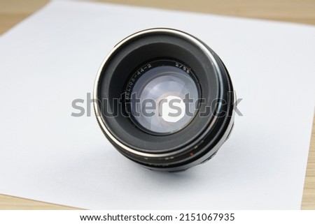 vintage manual lens on a white background close-up