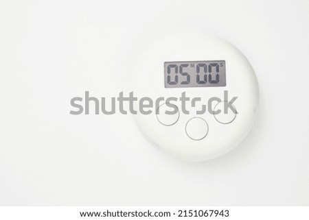 electronic timer on a white background close-up