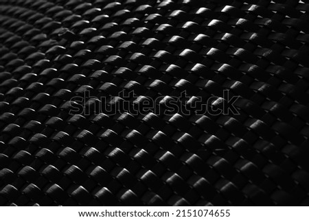 Close up of black metal geometric grid texture background