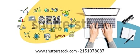 SEM with person using a laptop computer
