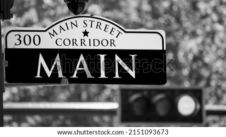 Black and White Image of Main Street Sign in Downtown Houston