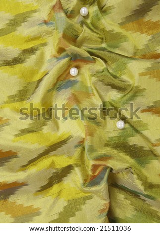 A colorful green silky background cloth