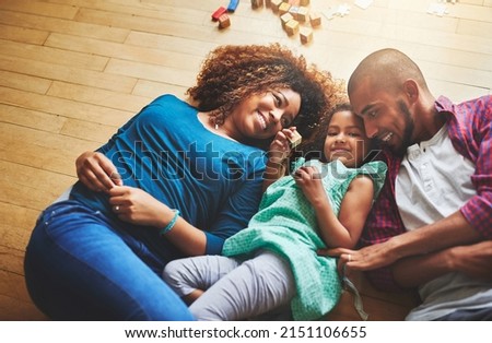 She can make any moment special. Cropped shot of a family of three spending quality time together. Royalty-Free Stock Photo #2151106655