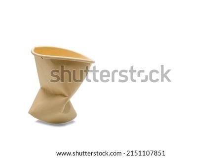 Crumpled used brown paper cup isolated on white background. Environmental friendly concepts. Royalty-Free Stock Photo #2151107851