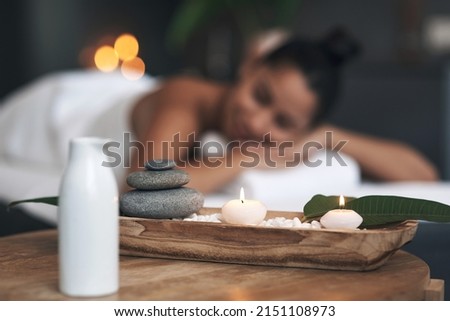 Feel all the good energy surround you. Closeup shot of a tranquil spa arrangement. Royalty-Free Stock Photo #2151108973